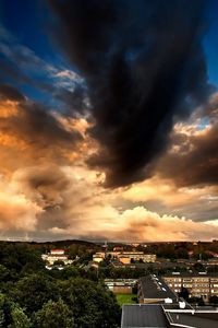 Preview wallpaper sky, gray, clouds, beams, sun, trees