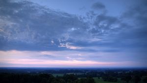 Preview wallpaper sky, plain, trees, height, morning