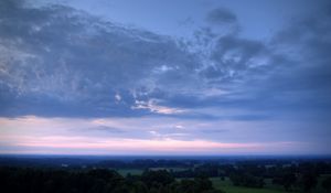 Preview wallpaper sky, plain, trees, height, morning