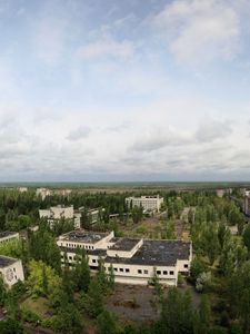 Preview wallpaper sky, roof, apartments, trees, ghost town