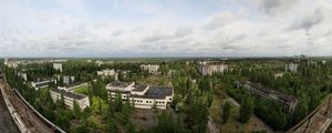 Preview wallpaper sky, roof, apartments, trees, ghost town