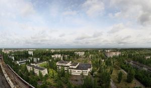 Preview wallpaper sky, roof, apartments, trees, ghost town