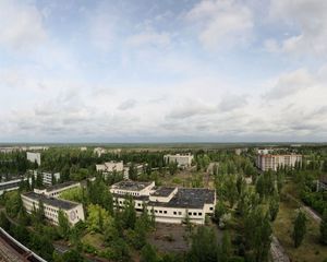 Preview wallpaper sky, roof, apartments, trees, ghost town