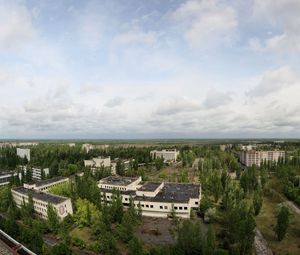 Preview wallpaper sky, roof, apartments, trees, ghost town