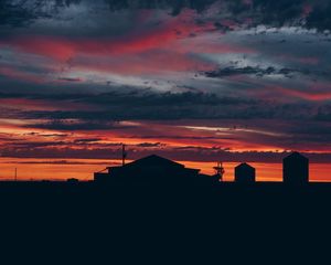 Preview wallpaper sky, sunset, building, cloudy, clouds