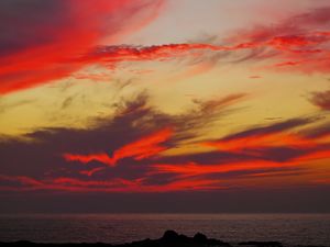 Preview wallpaper sky, sunset, clouds, sea, hills