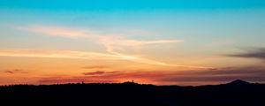 Preview wallpaper sky, sunset, dusk, silhouette, hills