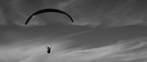 Preview wallpaper skydiver, ocean, coast, black and white