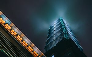Preview wallpaper skyscraper, architecture, bottom view, backlight, night, night city