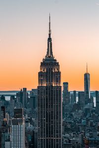 Preview wallpaper skyscraper, architecture, buildings, city, sunset, sky