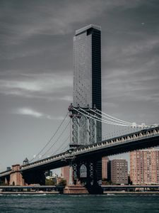 Preview wallpaper skyscraper, bridge, city, sea