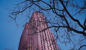 Preview wallpaper skyscraper, building, architecture, trees, garland