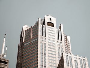Preview wallpaper skyscraper, building, architecture, brown, modern