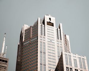 Preview wallpaper skyscraper, building, architecture, brown, modern