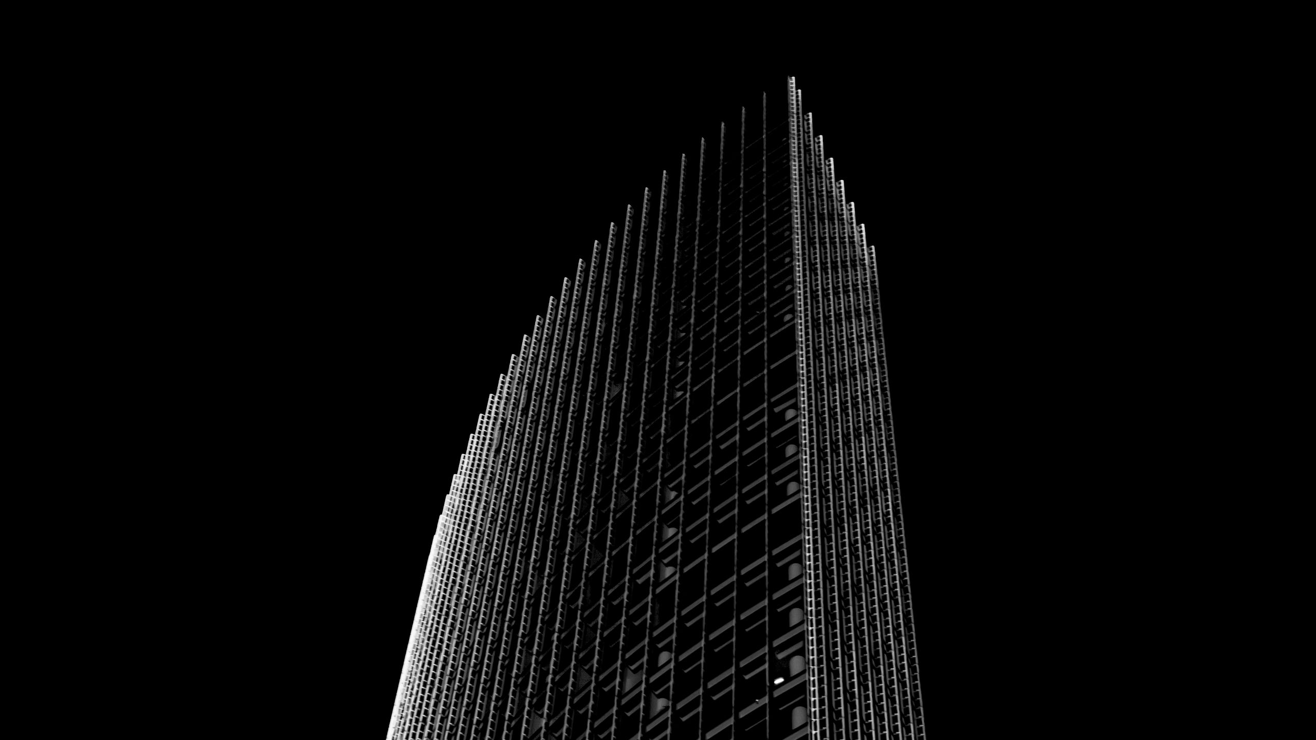 Download wallpaper 2560x1440 skyscraper, building, black and white,  minimalism, architecture, facade widescreen 16:9 hd background