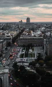 Preview wallpaper skyscraper, building, city, road, cars
