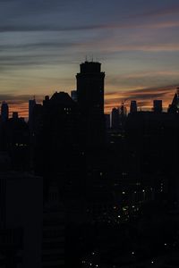 Preview wallpaper skyscraper, building, evening, dusk, sunset