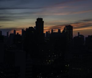 Preview wallpaper skyscraper, building, evening, dusk, sunset