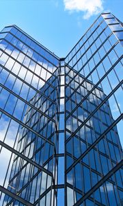 Preview wallpaper skyscraper, building, facade, glass, reflection