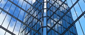 Preview wallpaper skyscraper, building, facade, glass, reflection