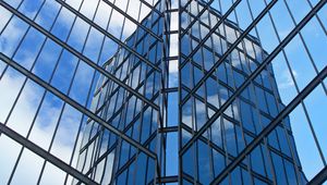 Preview wallpaper skyscraper, building, facade, glass, reflection
