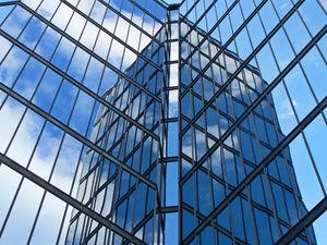 Preview wallpaper skyscraper, building, facade, glass, reflection