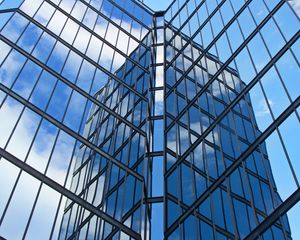 Preview wallpaper skyscraper, building, facade, glass, reflection