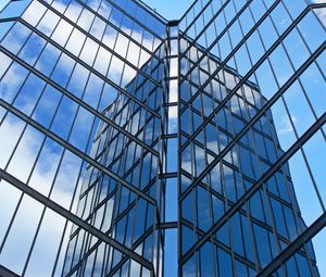 Preview wallpaper skyscraper, building, facade, glass, reflection