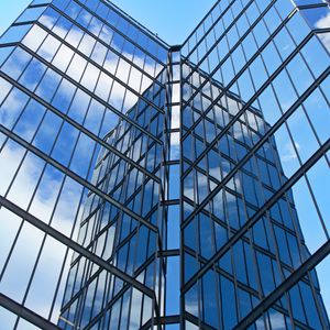 Preview wallpaper skyscraper, building, facade, glass, reflection