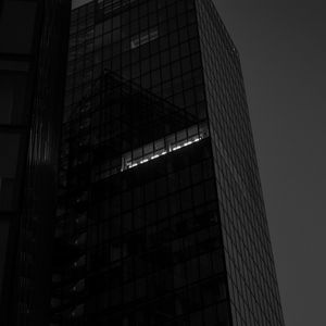 Preview wallpaper skyscraper, building, light, windows, black