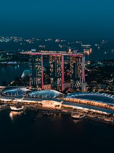 Preview wallpaper skyscraper, buildings, architecture, night, lights, sea