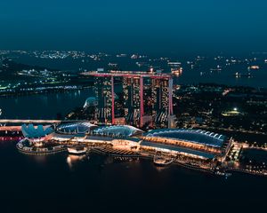 Preview wallpaper skyscraper, buildings, architecture, night, lights, sea