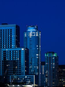 Preview wallpaper skyscraper, buildings, city, lights, architecture