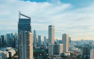 Preview wallpaper skyscraper, buildings, city, road, architecture