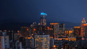 Preview wallpaper skyscraper, buildings, city, lights, architecture, night