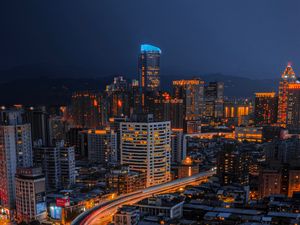 Preview wallpaper skyscraper, buildings, city, lights, architecture, night