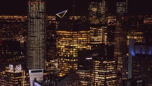 Preview wallpaper skyscraper, buildings, lights, night, city