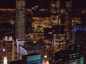 Preview wallpaper skyscraper, buildings, lights, night, city