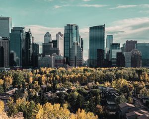 Preview wallpaper skyscraper, buildings, mountains, forest