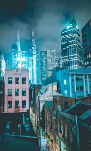 Preview wallpaper skyscraper, buildings, neon, night, architecture
