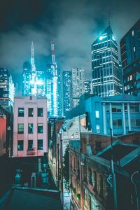 Preview wallpaper skyscraper, buildings, neon, night, architecture