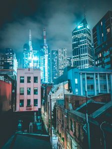 Preview wallpaper skyscraper, buildings, neon, night, architecture
