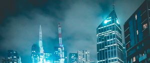 Preview wallpaper skyscraper, buildings, neon, night, architecture