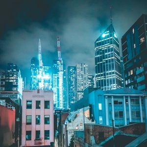 Preview wallpaper skyscraper, buildings, neon, night, architecture
