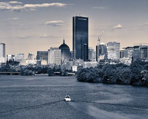 Preview wallpaper skyscraper, buildings, river, trees, boat, city