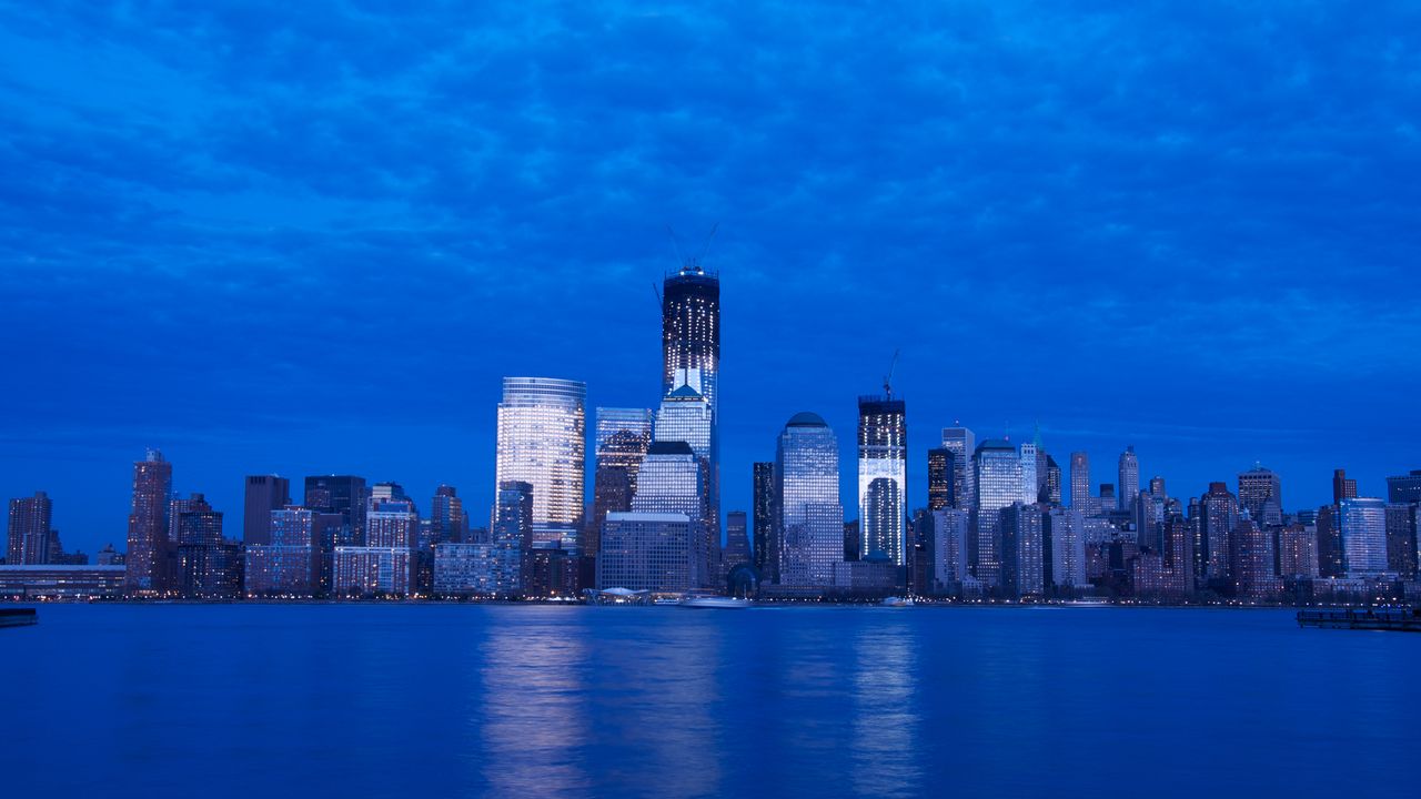 Wallpaper skyscraper, buildings, river, lights, evening, blue