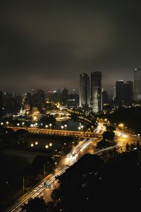 Preview wallpaper skyscraper, buildings, road, lights, city, night