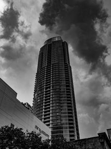 Preview wallpaper skyscraper, bw, facade, clouds