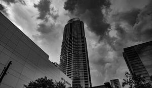 Preview wallpaper skyscraper, bw, facade, clouds