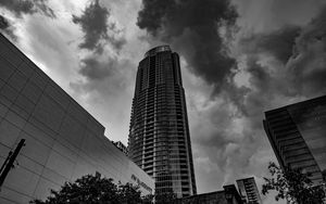Preview wallpaper skyscraper, bw, facade, clouds